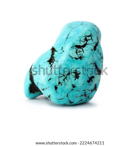 Mineral natural semiprecious stone turkvenit blue gemstone. Isolated on a white background. Geology. Royalty-Free Stock Photo #2224674211