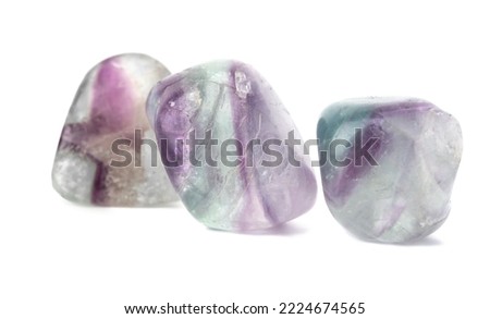 Set mineral natural semiprecious stone fluorite gemstone. Isolated on a white background. Geology. Dreen and violet Royalty-Free Stock Photo #2224674565