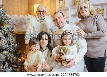 big family in new year christmas holidays, grandmother, grandfather, parents and children