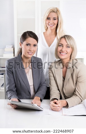 Successful woman business team in the office. Concept: career