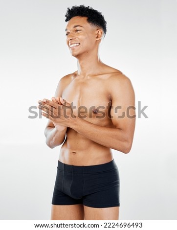 Fitness, health and wellness with man in a studio for exercise, body care and workout advertising on white background. Healthy, training and black man model proud, smile and happy with body goals Royalty-Free Stock Photo #2224696493
