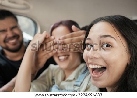 Car, travel and friends selfie by happy, smile and fun people joke, playful and silly on a road trip. Face, portrait and family traveling, taking picture and being crazy while on a journey together