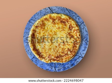 Khachapuri on a plate stands on an iron table. Hot cheese flatbread. Hearty tasty breakfast or snack. Background for the site, banner, flyer.