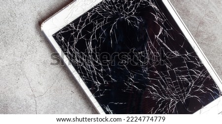 Top view of Computer tablet with broken Touchscreen, Tablet computer with broken screen
