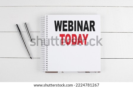 WEBINAR TODAY text written on a notebook on the wooden background