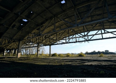 Metal structures German air hangars, abandoned military airfield Notif on Baltic spit