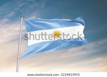 Waving Flag of Argentina in Blue Sky. Argentina Flag on pole for Independence day. The symbol of the state on wavy fabric.