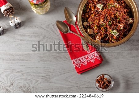 Christmas plate with Christmas decoration, red rice