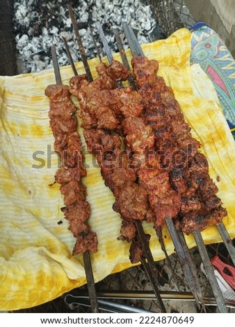 This picture elaborate that this is a BBQ in a family party . this is spicy and called tasty 
