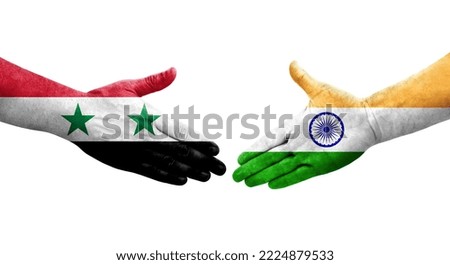 Handshake between India and Syria flags painted on hands, isolated transparent image.
