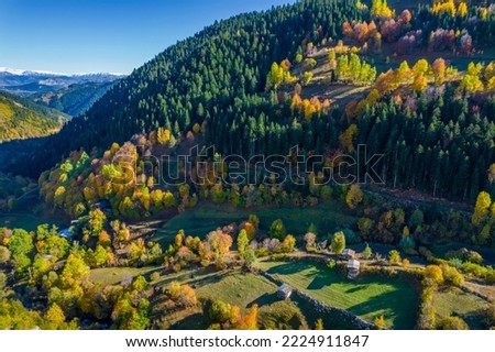 Autumn view in Savsat. Artvin, Turkey. Beautiful autumn landscape with colorful trees. Bazgiret Maden Village. Aerial drone shot.