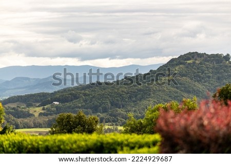 Hinterland Area of Byron Bay during autumn season with beautiful mountain landscape.  Royalty-Free Stock Photo #2224929687