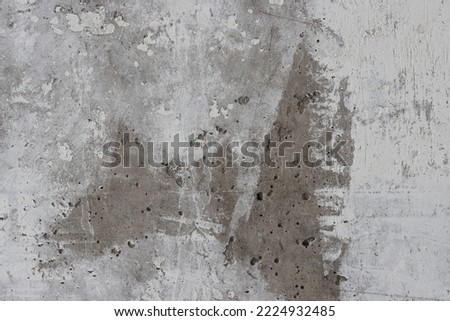 Texture of old concrete wall. Rough gray concrete surface with white spots. Perfect for background and design. Closeup. High resolution.