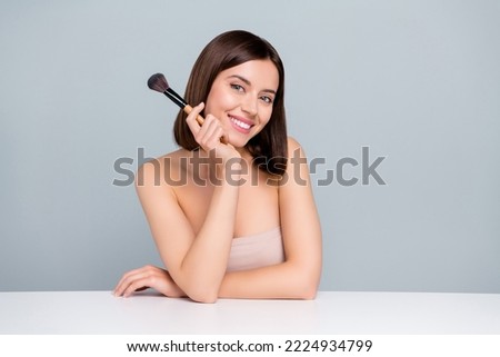 Photo of beautician lady hold powder brush stylist prepare event date isolated over grey color background