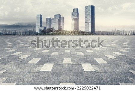 Doomsday atmosphere empty brick plaza floors with panoramic city skyline and skyscraper buildings