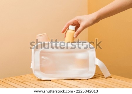 Bath accessories, toilet bag for different self care items Royalty-Free Stock Photo #2225042013