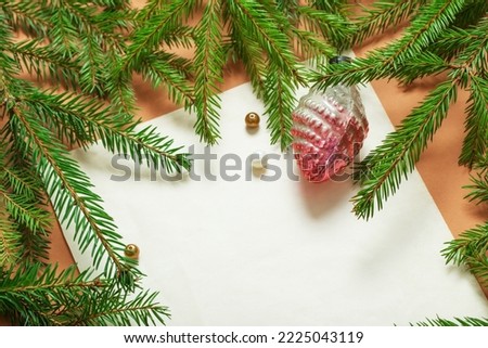 vintage christmas background with fir branches and old retro toys