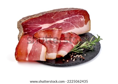 Spanish jamon iberico, serrano ham, isolated on white background. High resolution image Royalty-Free Stock Photo #2225062435