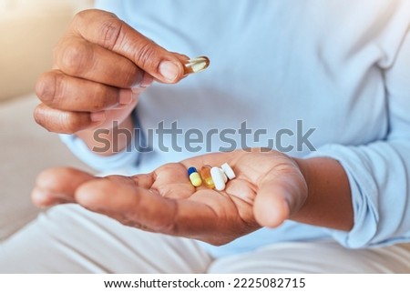 Health, wellness and pills in hand for medicine self care of black woman for pharmaceutical routine. Drugs, supplement and healthy chronic medication for vitality lifestyle of lady with hands zoom. Royalty-Free Stock Photo #2225082715