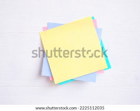 Sticky note ( Post-it) stack on a white wooden. Blank space for text and template for your message.
 Royalty-Free Stock Photo #2225112035
