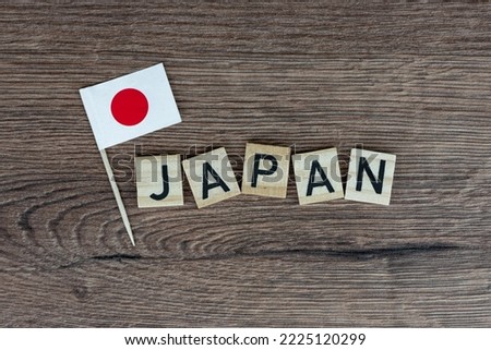 Japan - wooden word with japanese flag (wooden letters, wooden sign)
