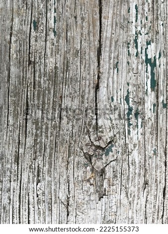 Closeup of old worn wooden timber deck board. The wood is dry and crack, can be used for writing messages on background or template.