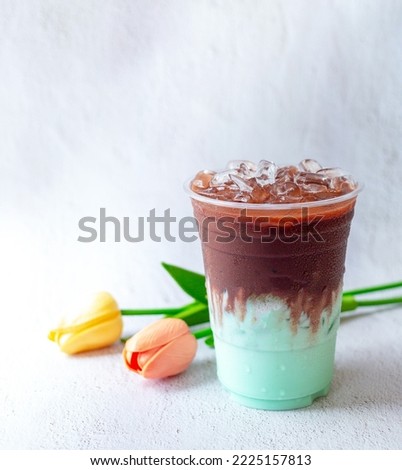 Product Cold drink menu of mixed cocoa chocolate mint drink in a plastic glass.