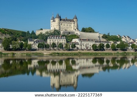 Wonderful castle of saumur reflected on the river in a beautiful sunny day Royalty-Free Stock Photo #2225177369