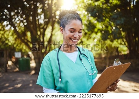 Woman, nurse and smile looking at clipboard in healthcare, medical or prescription in outdoor park. Happy female doctor or veterinary in nursing examination report, check or inspection for diagnosis