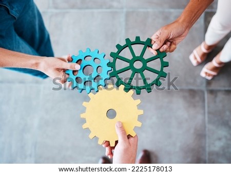 Settings, gear icon and teamwork with business people or team together for collaboration and synergy with cog wheel strategy. Office group hands for problem solving, innovation and development Royalty-Free Stock Photo #2225178013