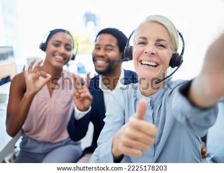 Call center, selfie and employees with hand sign for support, motivation and thank you in telemarketing business. Thumbs up, photo and portrait of customer service people excited about consulting