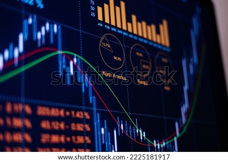 Business data, rising chart and lines on the screen. Computer monitor in the office with diagram and financial figures. Sales report, stock market data, corporate earnings and financial report. Royalty-Free Stock Photo #2225181917