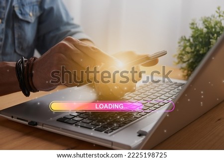Casual Businessman Touching Mobile Phone or Smart Phone and Yellow Magenta Loading Bar and Laptop Computer. Searching or Downloading Concept