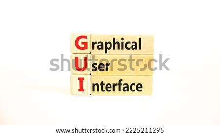 GUI graphical user interface symbol. Concept words GUI graphical user interface on wooden blocks on a beautiful white background. Business and GUI graphical user interface concept. Copy space.