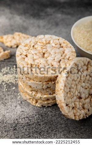 Round rice cakes on a  table. Crispbread.Puffed rice bread. diet crispy round rice cakes.Place for text. Place for copy. Healthy food. dietary product. Royalty-Free Stock Photo #2225212455