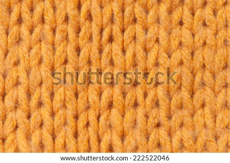 Yellow knitted wool background