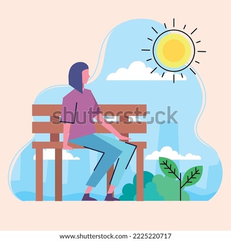 woman seated in park scene