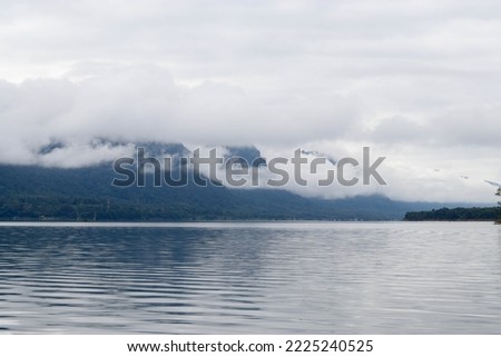 Cloudy forest mountain lake in Kanchanaburi.
