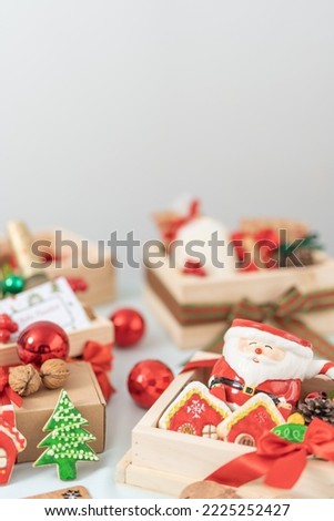 Vertical photo with copy space of wooden boxes with Christmas elements inside
