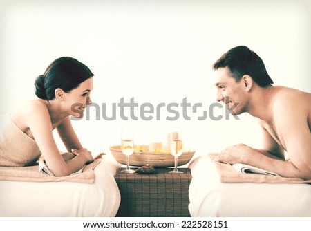 picture of couple in spa salon drinking champagne