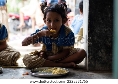 Students having mid day meal at school Royalty-Free Stock Photo #2225281755