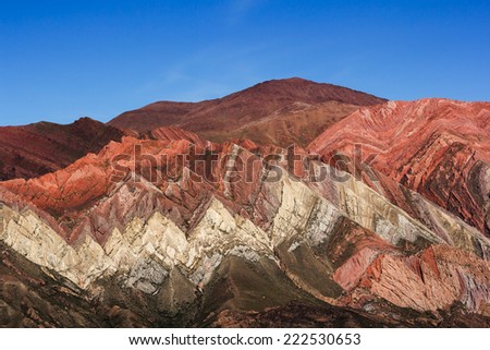 Hornocal Hill. The Quebrada de Humahuaca is a narrow mountain valley located in the province of Jujuy in northwest Argentina - similar landscape to the Geological Park of Zhangye Danxia, China.