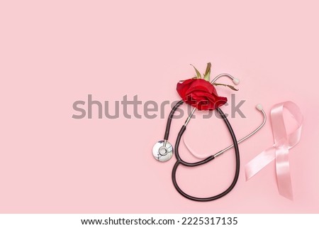 a red rose and a stel on a pink background, with the word breast cancer written in white letters