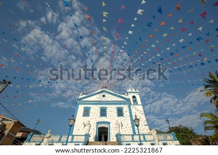 Church Nossa Senhora Dajuda, in Ilha Bela, north coast of Sao Paulo, adorned with flags typical of the June Festivals. Brazil