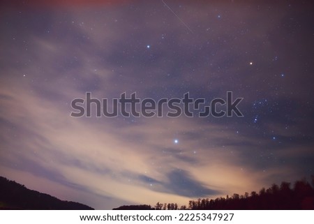 Orion constellation, Mars and Sirius in the night sky.