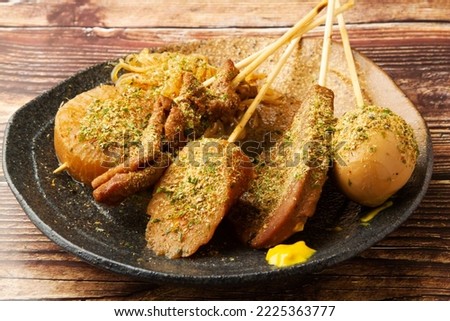 Oden in Shizuoka Prefecture uses a black soup that uses dark-colored soy sauce, with soup stock made from cow line meat. Royalty-Free Stock Photo #2225363777