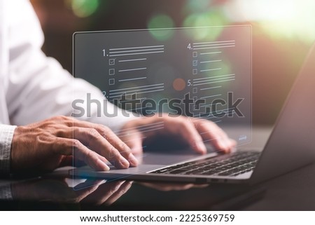 Businessman making a check mark on a virtual screen, online exam concept, choosing the correct answer in the exam, providing information in the assessment of the questionnaire, expressing opinions.