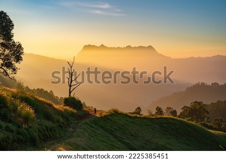 A beautiful Mountain named Doi Luang Chiang Dao mountain taken from Hadubi hill in Chiang Mai province of Thailand in the morning.

