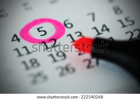 Pink circle. Mark on the calendar at 5.