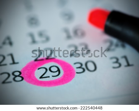 Pink circle. Mark on the calendar at 29.